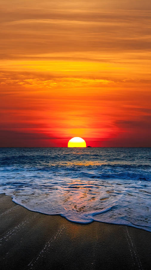 Orange Sunset Above Beach Android Wallpaper