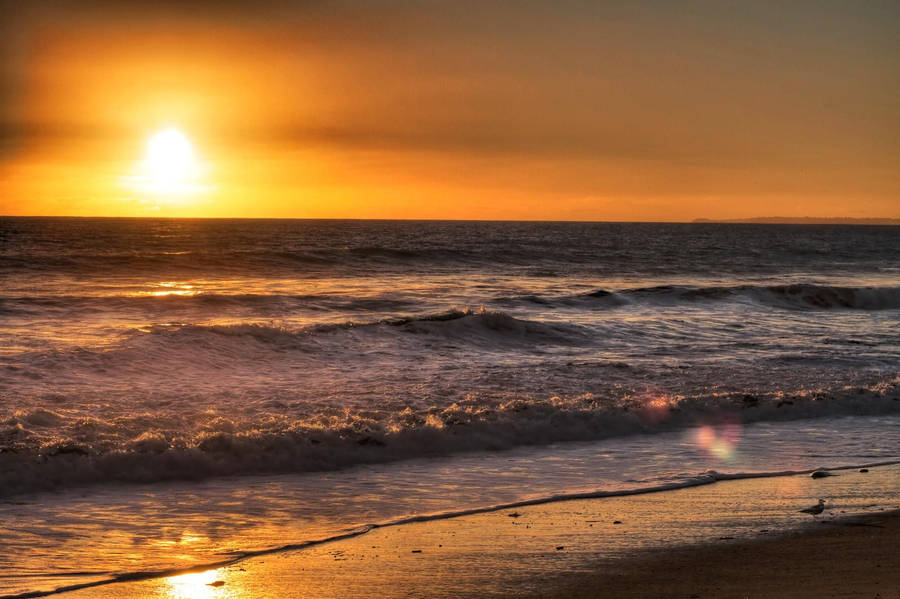 Orange Sunset On Malibu Beach Wallpaper