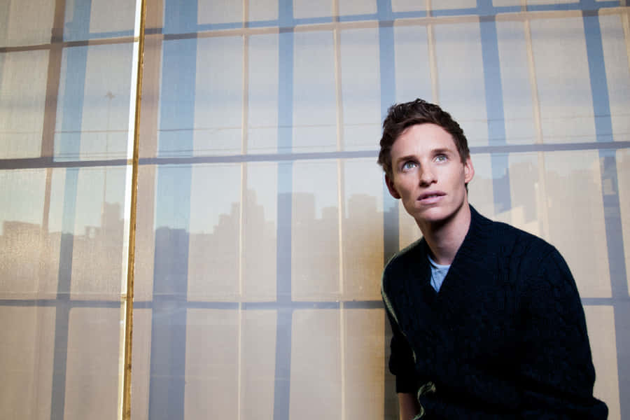 Oscar-winning British Actor Eddie Redmayne Looking Dapper In A Suit Wallpaper