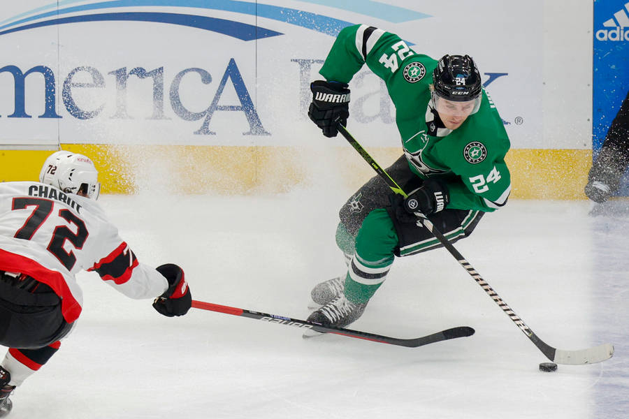 Ottawa Senators Defenseman Thomas Chabot In Action Against Dallas Stars Wallpaper