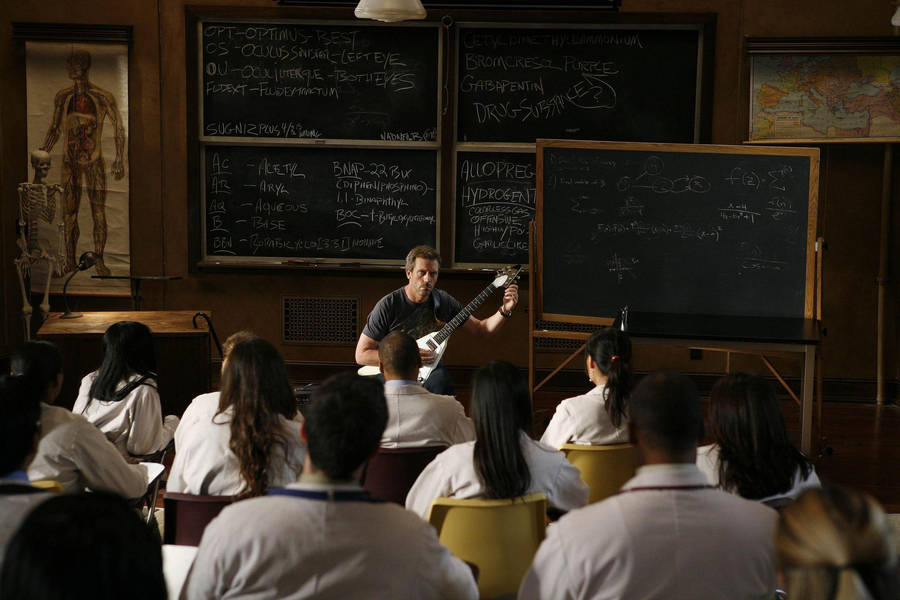 Packed Classroom With Teacher Wallpaper