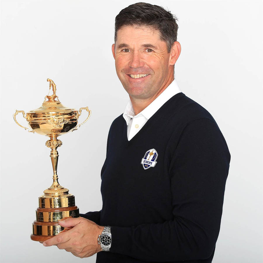 Padraig Harrington Celebrating With Golden Trophy Wallpaper