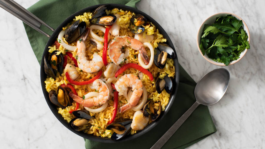 Paella Dish On Cast Iron Skillet Wallpaper