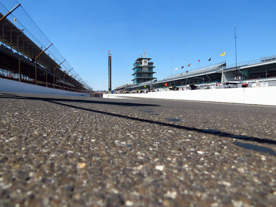 Panoramic View Of The Iconic Indianapolis 500 Race Track Wallpaper