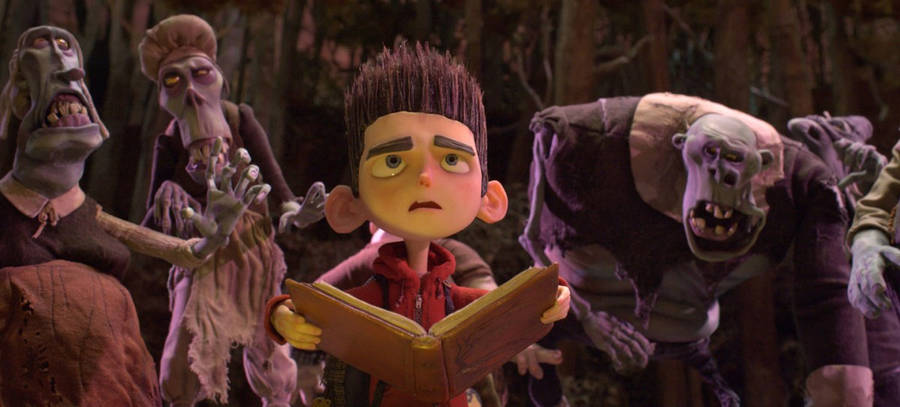 Paranorman's Norman Engrossed In Reading An Enchanting Book Wallpaper