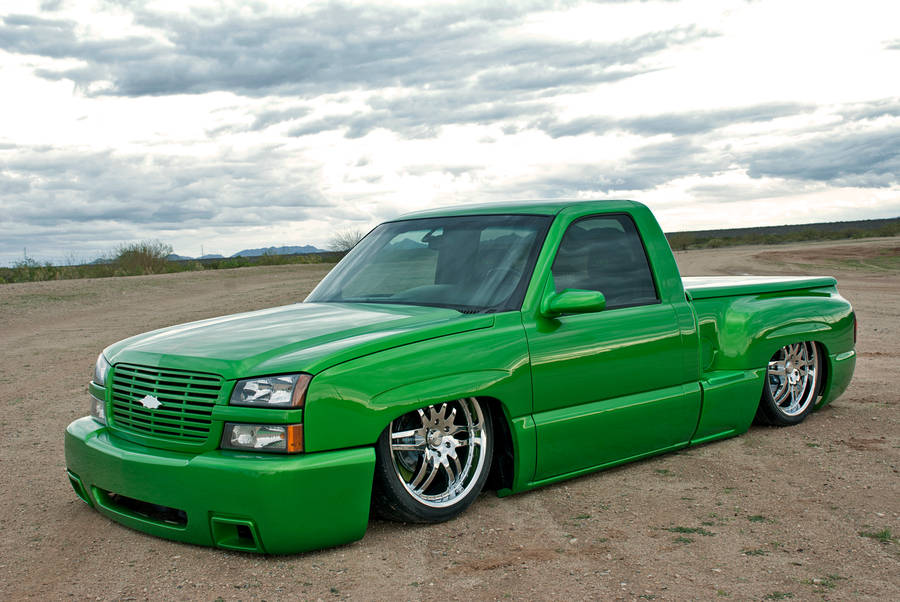 Parked Green Dropped Truck Wallpaper