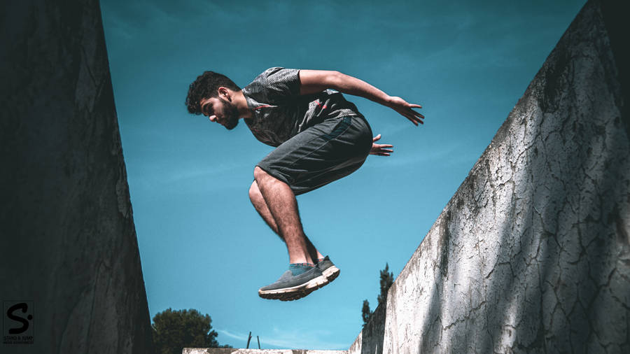 Parkour Man Midair Photography Wallpaper