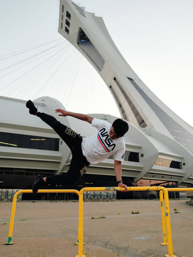 Parkour On Metal Bar Wallpaper