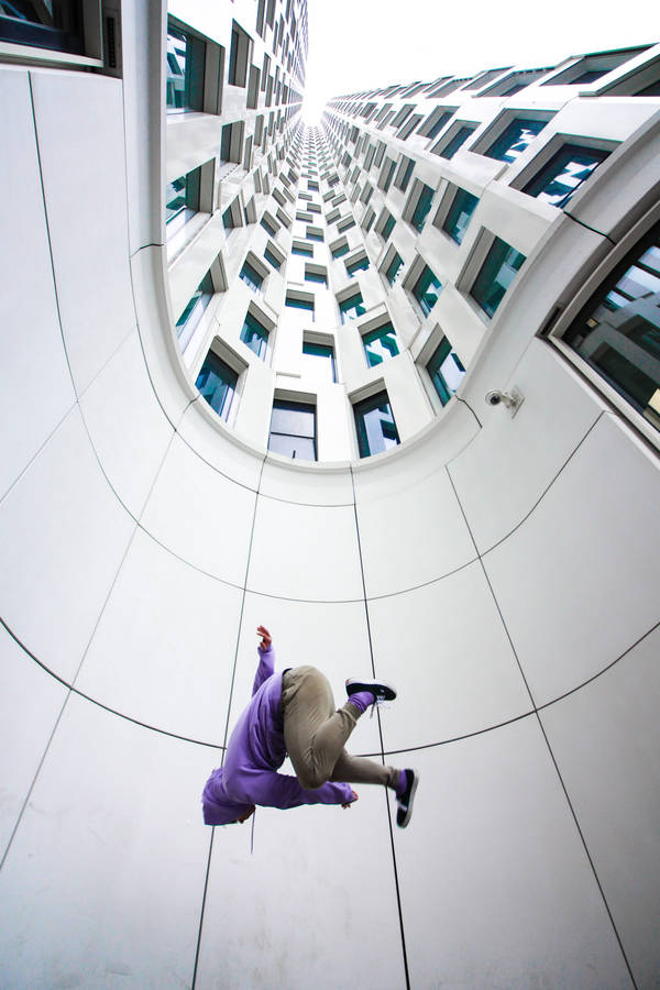 Parkour Under Tall Building Wallpaper