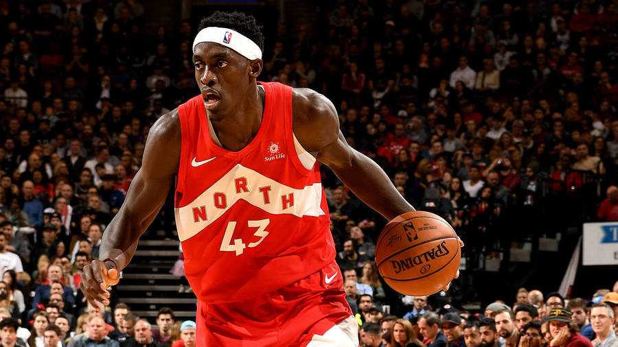 Pascal Siakam Dribbling The Ball Wallpaper