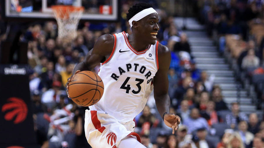 Pascal Siakam Running In Court Wallpaper