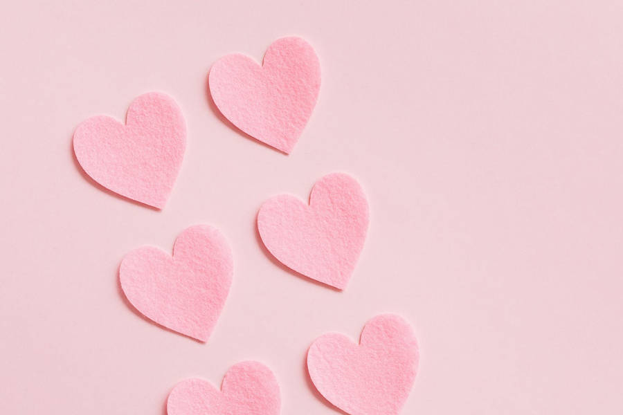 Pastel Pink Heart Cutouts In Pairs Wallpaper