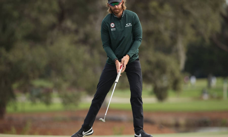 Patrick Rodgers Pondering His Next Shot On The Golf Course Wallpaper