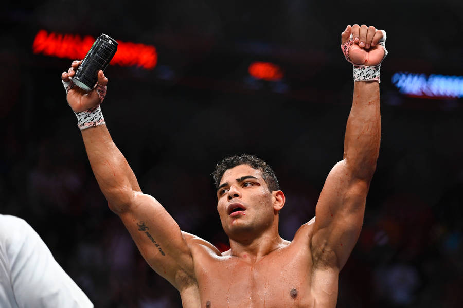 Paulo Costa Raising Hands In Victory Wallpaper