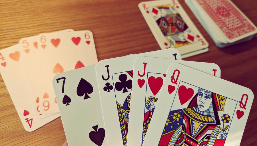 Peek At Rummy Playing Cards Wallpaper