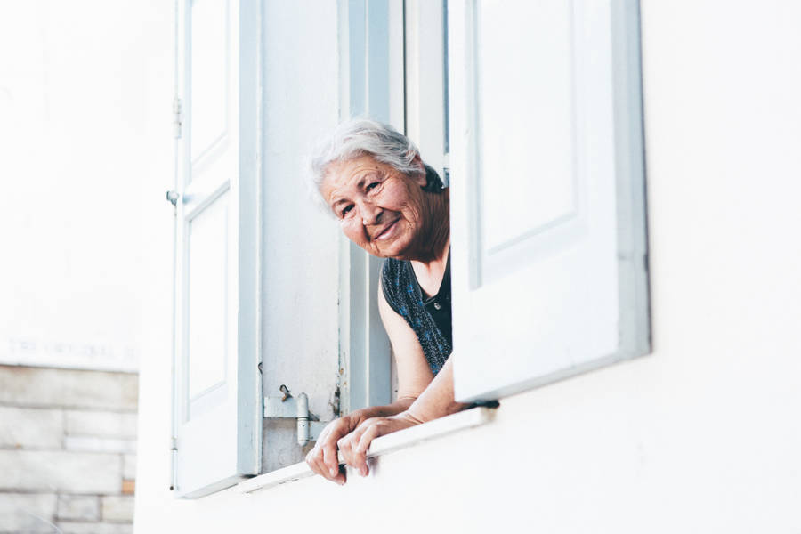 Peeking Beautiful Older Woman Wallpaper