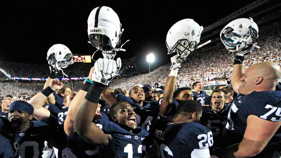 Penn State Raising Helmets Wallpaper