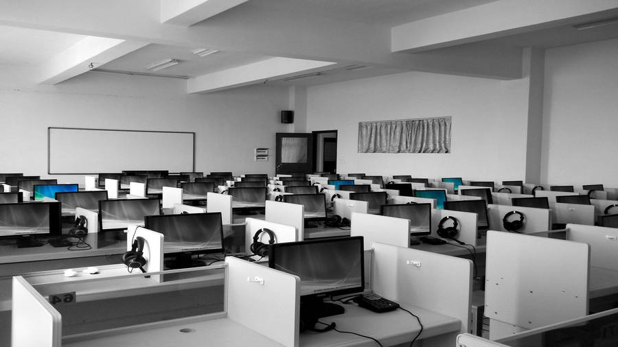 Perfectly Arranged White Office Desks Wallpaper