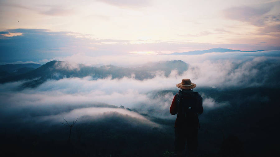 Person Journey Foggy Mountains Wallpaper