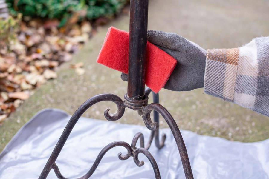 Person Restoring Metal Iron Fixtures Wallpaper