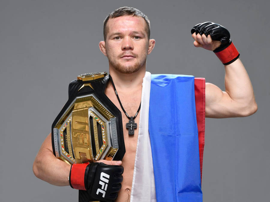 Petr Yan, The Champion's Pose, With The Ufc Belt Wallpaper