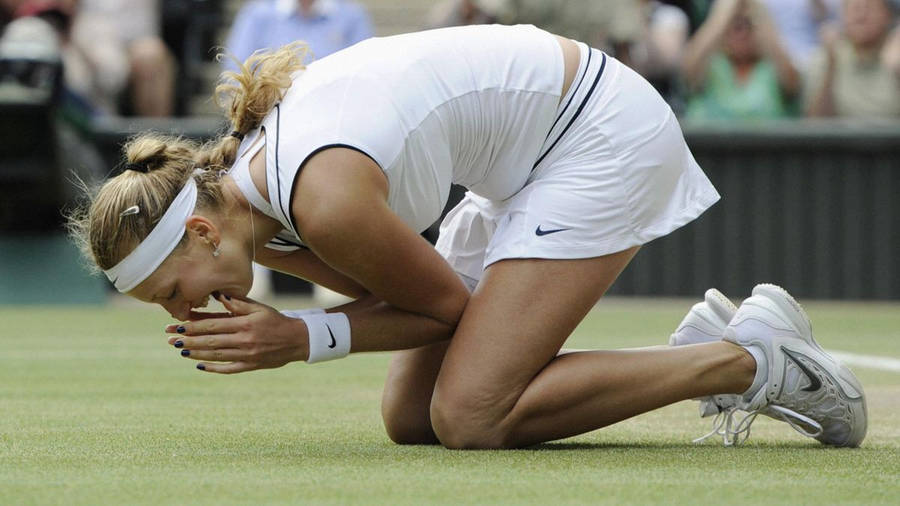 Petra Kvitova In Action During A Professional Tennis Match Wallpaper