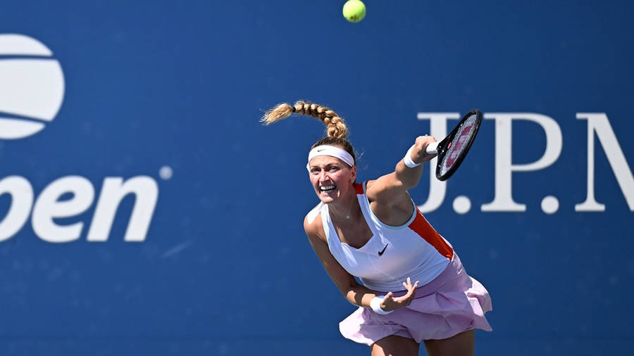 Petra Kvitova In Action During A Tennis Match Wallpaper