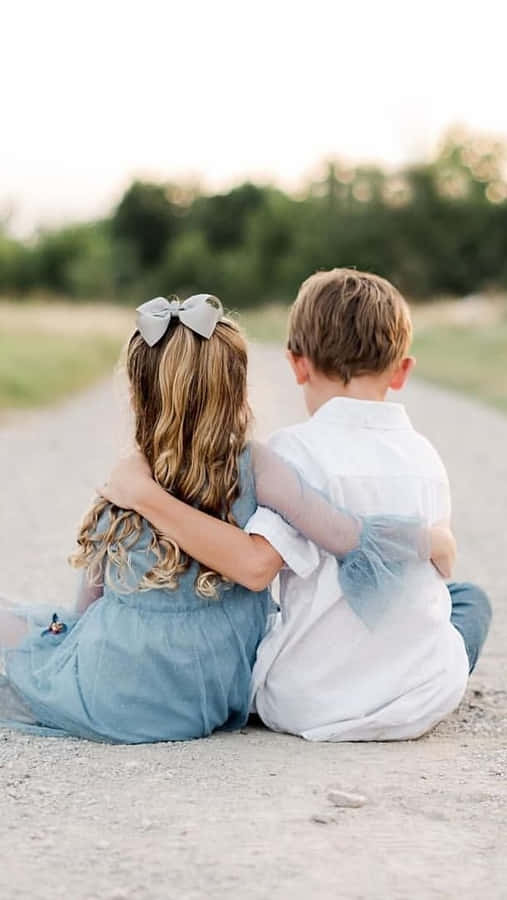 Photography Of Boy And His Cute Sister Wallpaper