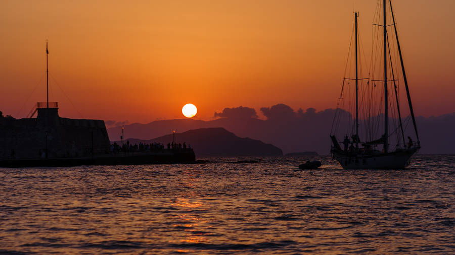 Picturesque Boat And Moon Desktop Wallpaper