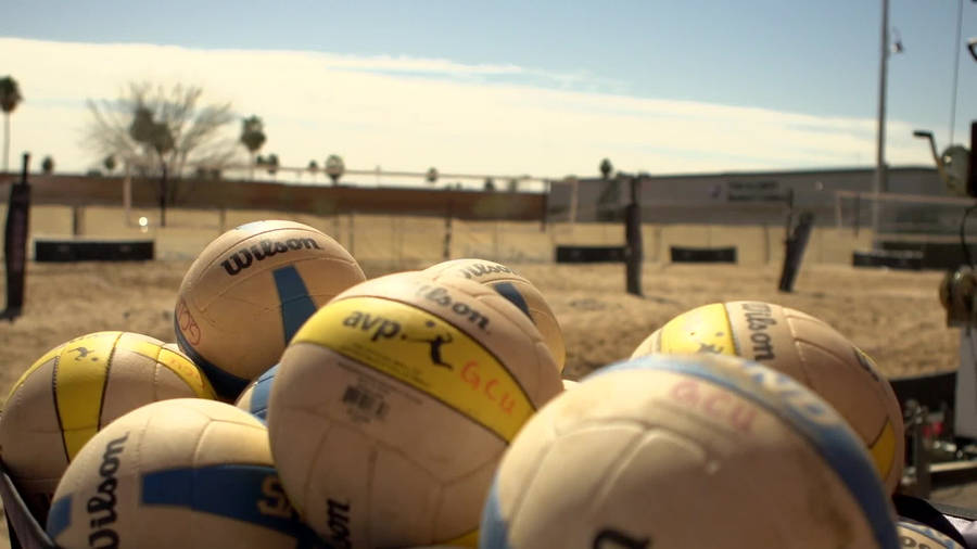 Pile Of Wilson Beach Volleyball Wallpaper