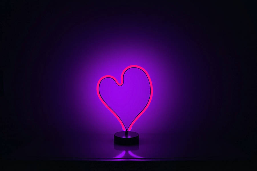Pink Neon Heart And Purple Glowing Light Wallpaper
