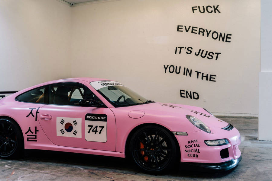 Pink Sedan Showcasing Anti Social Club Logo Wallpaper