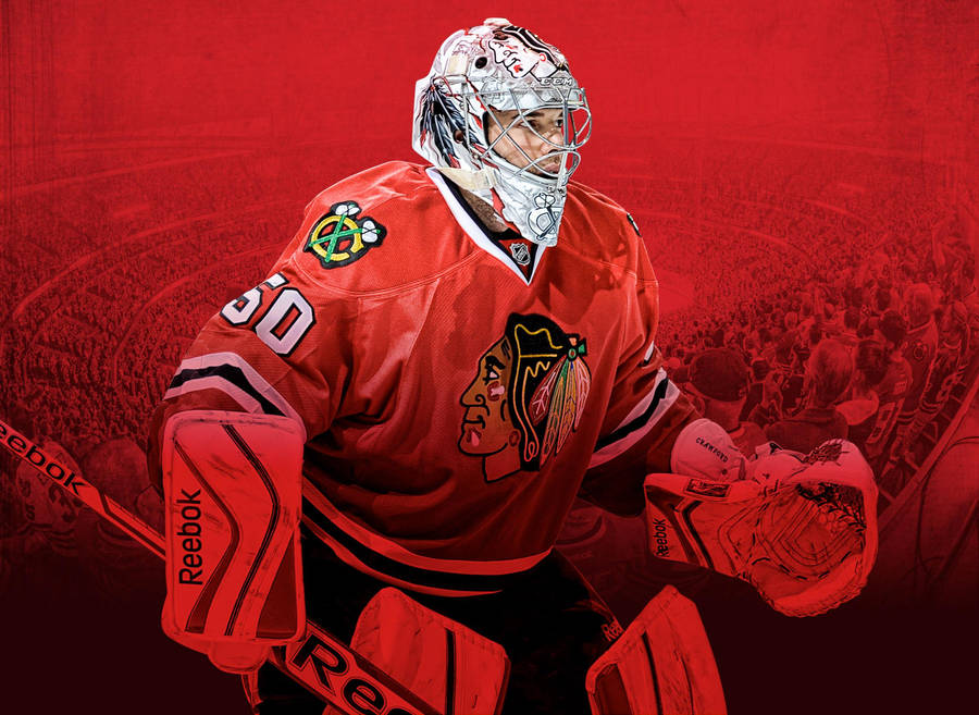 Pivotal Goalkeeper Corey Crawford Defending For The Chicago Blackhawks Wallpaper