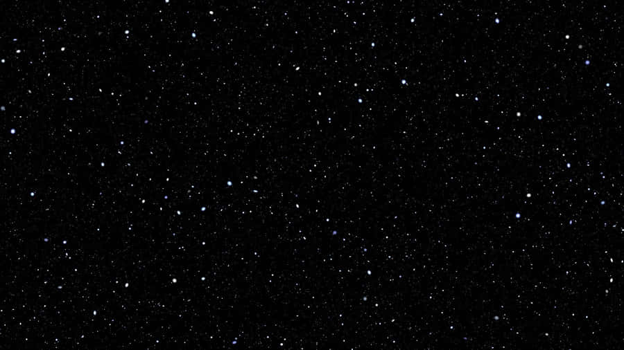 Plain Black Desktop With Twinkling Stars Wallpaper