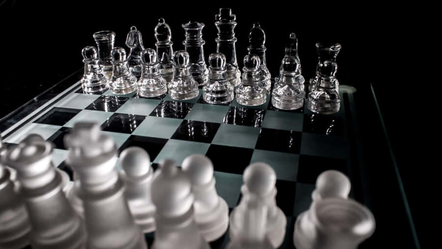 Play A Strategic Game Of Chess Wallpaper