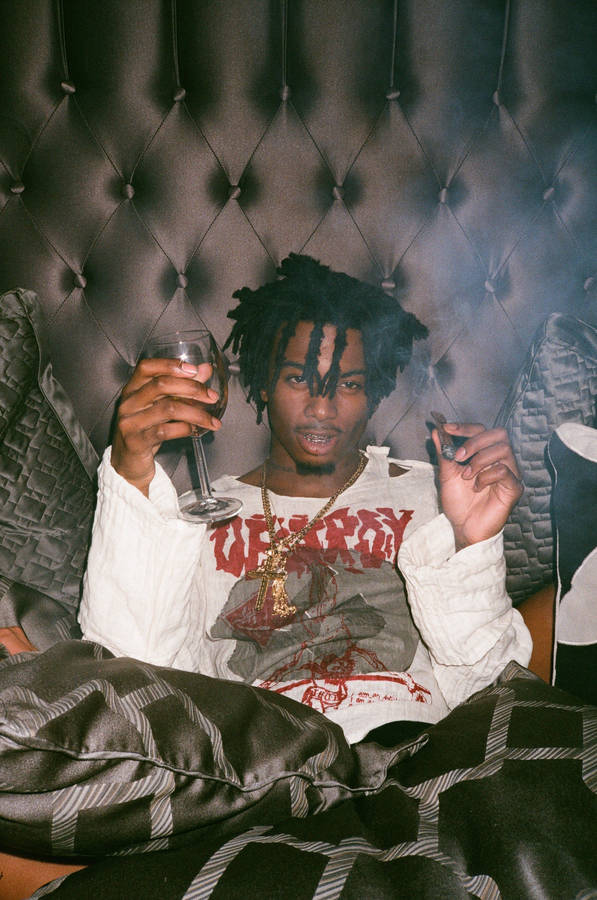 Playboi Carti In Bed Wallpaper