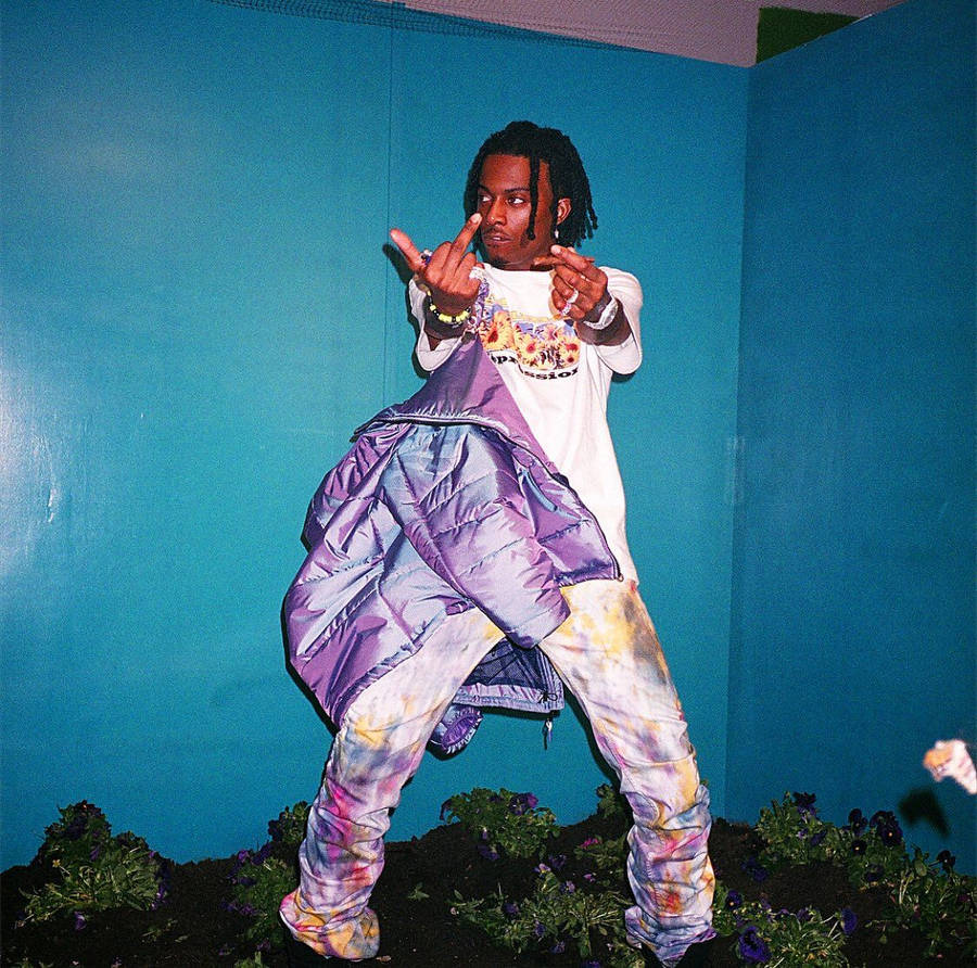 Playboi Carti In Purple Outfit Wallpaper