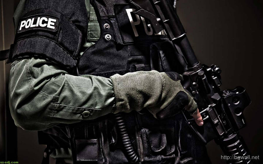 Police Vest And Gun Wallpaper