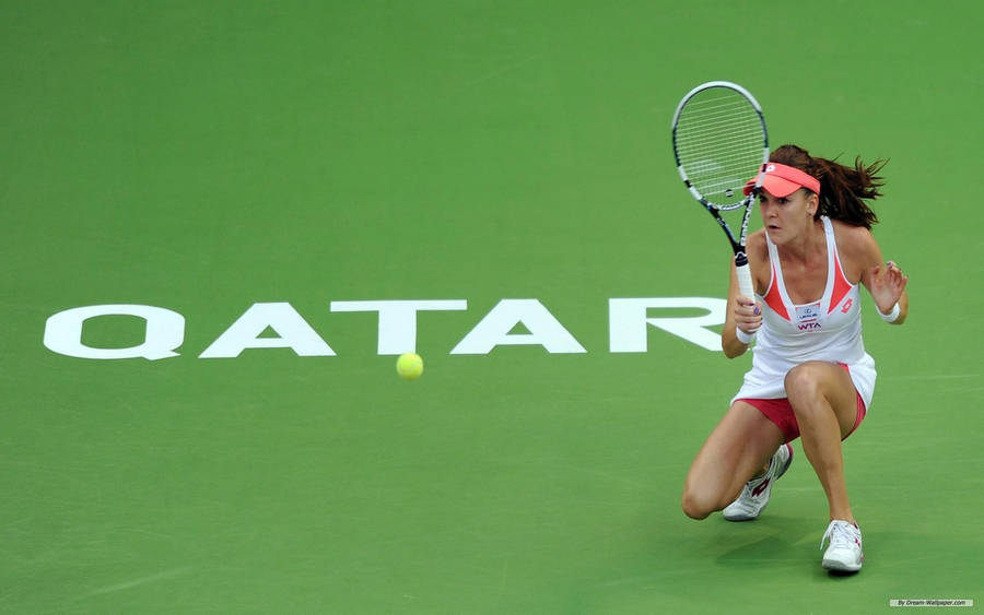 Polish Tennis Sensation Agnieszka Radwanska In Action Wallpaper