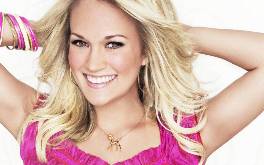 Pop Sensation Carrie Underwood Glowing In Pink Wallpaper