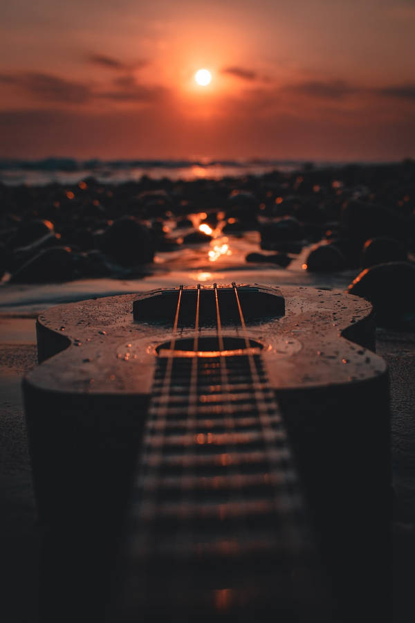 Popular Phone Ukulele Setting Sun Wallpaper