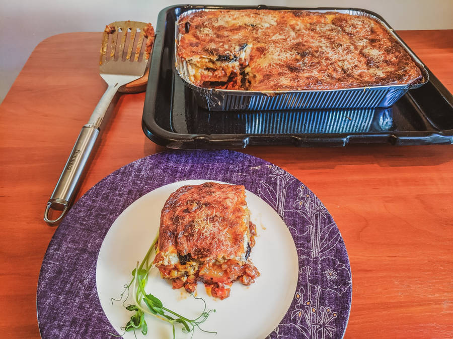 Portion Of Moussaka From A Tray Of Baked Casserole Wallpaper