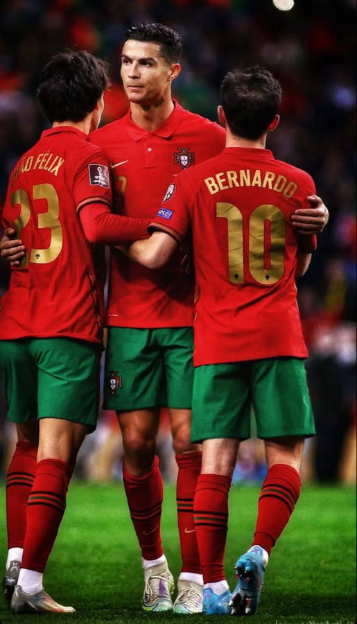 Portugal National Football Team Cr7 Hugging Co-players Wallpaper