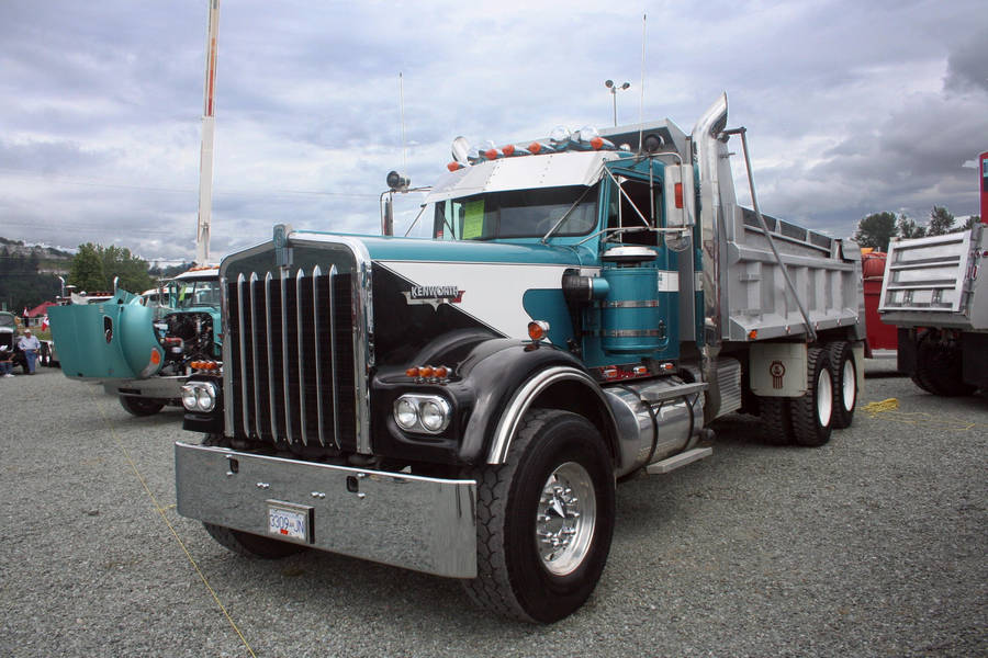 Powerful Kenworth W900 Dump Truck In Action Wallpaper