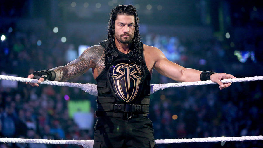 Powerful Roman Reigns Showcase Dominance Wallpaper