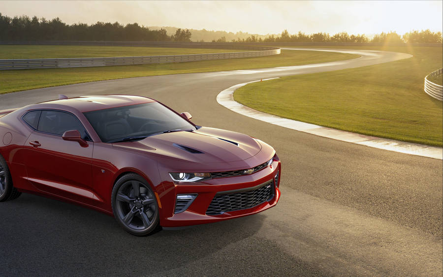 Pristine Red Camaro - The Quintessence Of Muscle Cars Wallpaper