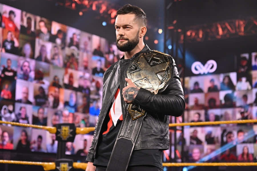 Pro Wrestler Finn Balor In A Power Pose Wallpaper