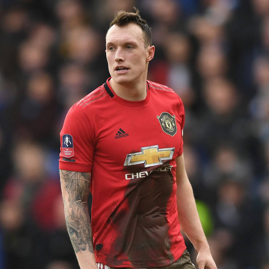 Professional Footballer Phil Jones In Action Wallpaper