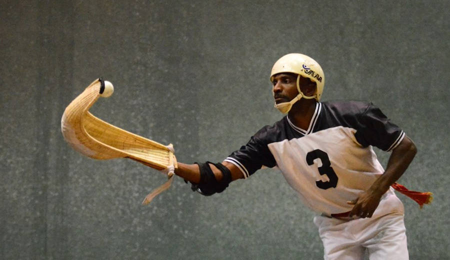 Professional Jai Alai Player In Action Wallpaper