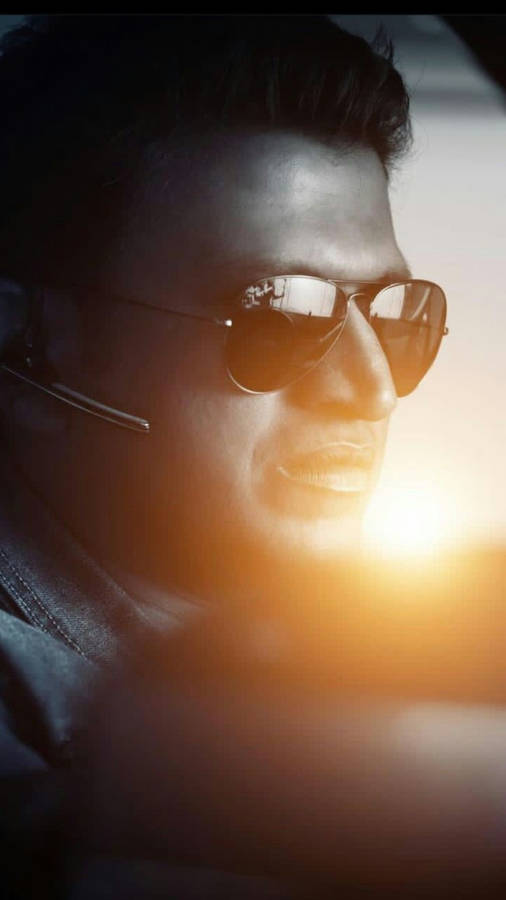 Puneeth Rajkumar Bright Sun Glare Wallpaper